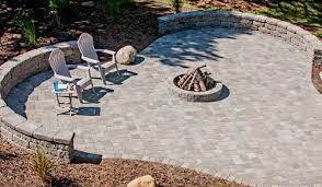 The weathered paving stones pair up nicely with the pillars in this patio. Cobblestone Pavers Patio Town