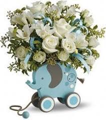 Send expertly styled bouquets and floral arrangements to welcome the new bundle of joy at the hospital, or celebrate a baby shower. 14 Baby Boy Arrangements Ideas Flower Arrangements New Baby Flowers Floral Arrangements