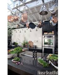 With a color palette inspired by the bark of the birch tree, the kitchen serves as both entertainment and gathering space. The 2011 Kitchen Of The Year With Tyler Florence