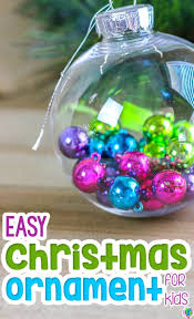 To create this festive display, simply frame vintage tea towels or to create the display, place a colorful poinsettia and a tabletop christmas tree in a wooden box. Quick Christmas Bulbs Ornament For Kids