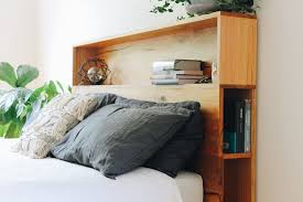 Platform Bed With Bookshelf Bedhead Featuring The Popular Bookshelves But Elevated On Top Of A Platform Bas Bookshelf Bed Timber Bed Frames Bed Linens Luxury