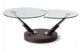 This piece comes in your choice of available finishes, polished for an extraordinary shine, and topped in thick, clear glass, tempered for extra strength. 20 Inimitable Styles Of Swiveling Glass Coffee Table Home Design Lover
