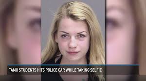 Aggie Arrested for Hitting Police Car After Taking Topless Snap