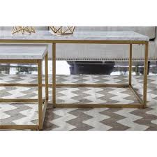 Black marble is decidedly moodier. Carol Modern Classic White Marble Brushed Gold Rectangular Nesting Coffee Table 51 W 60 W Kathy Kuo Home