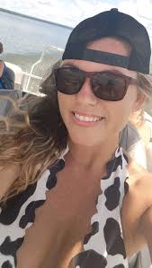 Chase wearing a Sunday straw boater hat