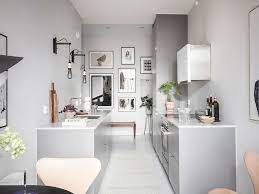This is the most basic idea for a charming gray and white kitchen, and it works best for smaller spaces. Kitchen With A Tiny Home Office Coco Lapine Design In 2021 Tiny Home Office White Apartment Home