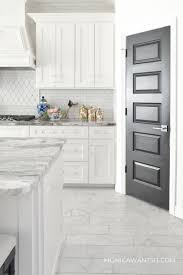 Black And White Marble Floor Kitchen Homeowners Guide To Black Interior Doors Monica Wants It Black Interior Doors Doors Interior Dark Doors