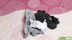 To begin this design, start by folding the shirt in half. How To Fold Clothes Fast With Pictures Wikihow
