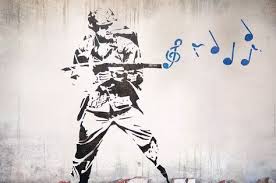 Banksy is a contemporary british street artist and activist who, despite his international fame, has maintained an anonymous identity. Banksy Music Soldier Street Art Banksy Banksy Artwork Street Art