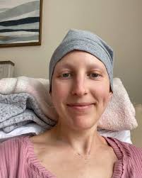 My name is Charlotte, and I was diagnosed with triple-negative breast  cancer in the summer of 2023 at age 32. One evening, after putting my  10-month-old daughter to bed, I went to