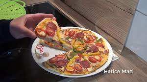 tavada pizza 2 kisilik 3 su bardagi un 1 cay bardagi ilik su 1 cay bardagi ilik sut 1 tatli kasigi kuru maya 1 tatli kasigi seker y yemek tarifleri yemek pizza