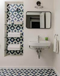 Not to mention how it could affect resale should we ever decide to move. Navy Blue Diamond Pattern Tiles Contemporary Bathroom