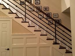 Most people pay between $700 and $4,600 for materials and labor. Added The Board And Batten Wainscoting Plus The Custom Horizontal Wrought Iron Railing With Rustic Knuckles Wrought Iron Stairs Basement Stairs Stairs