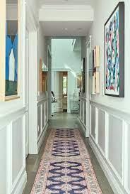 Despite being open, the tall wall to the side of the door blocks much of the light and makes the foyer dark. A Long Narrow Hallway Help For A Dark Scary Mess Laurel Home