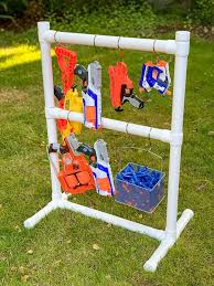 Attach 2 hooks spaced about the same. Ideas To Build A Nerf Gun Rack Amazon Com Nerf Elite Blaster Rack Toys Games This Video Shows How I Made My Nerf Gun Rack For My Son