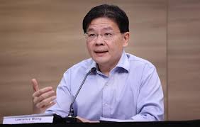 Wong guan yi (english name: Lawrence Wong Hints At Possible Delay In Phase 3 Reopening