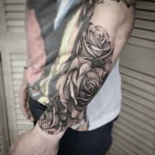 Men's rose tattoos are versatile, but the location of your ink can impact the overall design. Top 10 Flower Tattoos For Men Entertainmentmesh