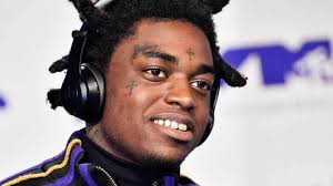 Does kodak black have tattoos? Kodak Black Draws Tattoo On A Fanatic Fan S Forehead