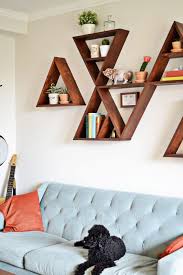 If you have an old door, you can use it to create a great shelf that will be perfect for living rooms, dining rooms, or anywhere else. Diy Shelves 18 Diy Shelving Ideas