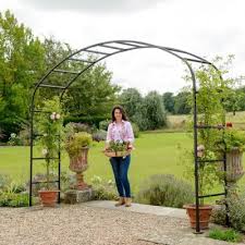 Mar 26, 2020 · wrought iron berrington arbor trellis garden structure $399.95, 2/$749.90, 4/$1,349.80, 6/$1,924.70, 8/$2,549.60 wrought iron cross medallion waverly arbor trellis Metal Garden Arches