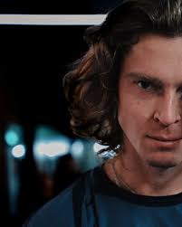 Just a joke in the @copperboxarena corridor. @jimchardy walks through the  players' lounge, grabs the photographer's camera, and takes a close  portrait of @andreyrublev. The photographer captures the moment with his old