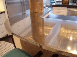 Mirror polished zinc bar top with a cold cast zinc edge profile in our allentown style. Zinc Bar Tops