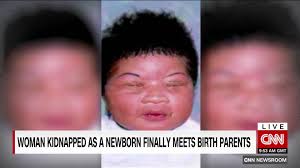 Woman kidnapped as a baby meets birth parents