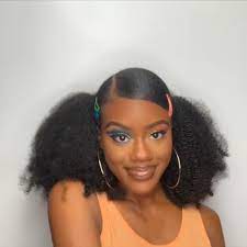 The hair braided and styled into a high ponytail. Natural Hair Stylesleek Ponytails Video Hair Ponytail Styles Short Natural Hair Styles Natural Afro Hairstyles