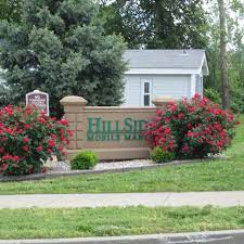 With plenty of lush, green garden areas, rock details. Hillside Manor Manufactured Housing Community O Fallon Mo