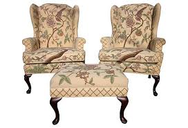 Clyde Pearson Pair Of Wingback Armchairs And A Matching Ottoman Fine Hand Embroidered Crewelwork Textile Curated Chair And Ottoman Vintage Furniture Chair