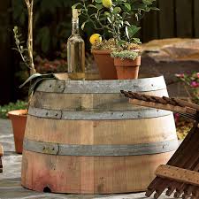 The most common half wine barrel table material is metal. Outdoor Wine Barrel Table
