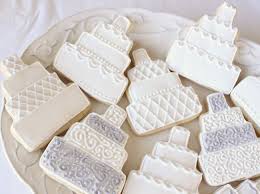 These decorated sugar cookies comprise mostly of pure wheat flour and natural flavors. Wedding Cake Cookies Sugar And Spice And All Things Iced Wedding Cake Cookies Sugar Cookies Decorated Wedding Shower Cookies