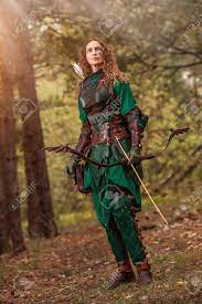 There are no requirements to wear it. Elf Woman In Green Leather Armor With The Bow And Arrows On The Stock Photo Picture And Royalty Free Image Image 63214225