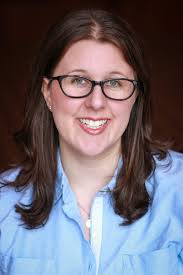 Dad's Garage's new managing director Katie Pelkey is laughing