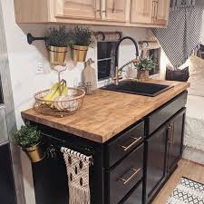Chic Black Cabinets In This Gorgeous Camper By Sassafras Lou Rvrenovation Camperrestoratio Vintage Camper Remodel Glamper Camper Remodeled Campers