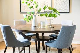 The gray highlights in brown hair seem to reflect and enhance the muted tones of the ash chocolate base color, giving it brown hair with silver highlights that have a violet tint suits brunettes and asian women in particular. Gray Dining Chairs At Dark Brown Round Wood Table Transitional Dining Room