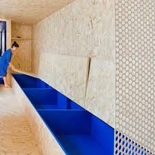 The name comes from the fact that the wood pieces in each layer point in the same direction. Oriented Strand Board Architecture And Design Dezeen