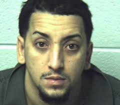 Cops: Latin King jailed after shooting outside bar