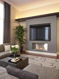 Handsome Fireplace Tv With Recessed Lighting Creates Warmth Without Clutter Contemporary Living Room Design Small Modern Living Room Modern Family Rooms