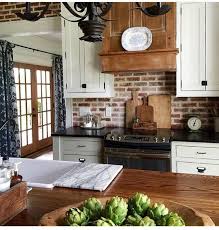 More Of The White Cabinets Black Countertop Brick Backsplash Kitchen Remodel Stylish Kitchen Home Kitchens