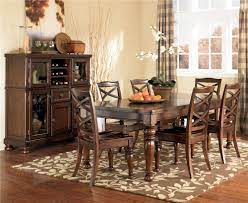 Satisfying your taste for traditional furnishings, the porter dining room extension table is beautifully elegant, without looking fussy. Ashley Furniture Porter 7 Piece Rectangular Extension Table Chair Set Wayside Furniture Dining 7 Or More Piece Sets