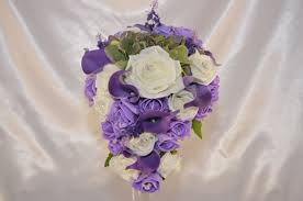 When did thebridesbouquet.com start selling flowers? Brides Lilac Purple Ivory Rose Brides Tear Drop Wedding Bouquet With Purple Bouquets By Design
