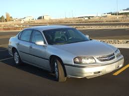The New Impala Displayed A More Subdued Exterior As Chevy Revamped All The Sheet Metal Except For The Roof De 2003 Chevrolet Impala Chevrolet Impala Used Cars