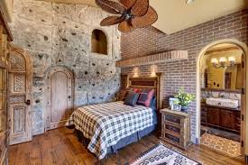It is designed to be the working focal point for anchoring, belaying, and a number of auxiliary tasks that might happen while rock climbing. Boys Room With Rock Climbing Wall