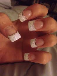 Glitter White Acrylic Tips With Silver Accent Glitter White French Tips Acrylic Nails Acrylic Nail Designs Trendy Nails Fashion Nails