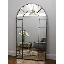 The entire glass mirror is not surrounded by the frame, it is independent of the frame. Crushed Black Arched Full Length Metal Mirror 71 X 40 Chicago William Wood Mirrors