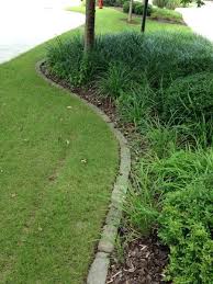 You can change the look of the garden with the type, size and shape of the logs you use. Explore Garden Edging Ideas On Pinterest See More Ideas About Stone Garden Edging Ideas Flower Garden Edging Brick Garden Edging Landscaping With Rocks