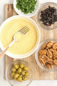 Let the couscous sit for 10 minutes, squeeze in the juice of ½ lemon, then fluff with a fork. Grilled Moroccan Chicken Thighs With Pecan Couscous Andie Mitchell