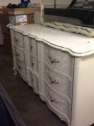 The set is painted & distressed in a smokey grey chalk paint with crisp white pulls. How To Refinish My French Provincial Bedroom Set