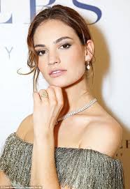 Lily James exudes Old Hollywood glamour in Bardot gown